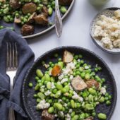edamame and potato salad on bowl next to dish of almond ricotta, salad dressing and fork