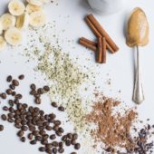 peanut butter on spoon with banana, cocoa and hemp hearts
