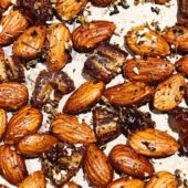 almonds, dates and spices on parchment paper