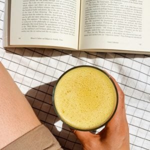 vegan orange julius drink with book