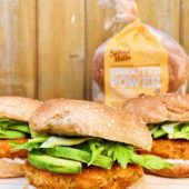 veggie burger on bun with avocado and lettuce