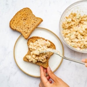 Putting together Registered Dietitian Desiree Nielsen's Chickpea Sandwich