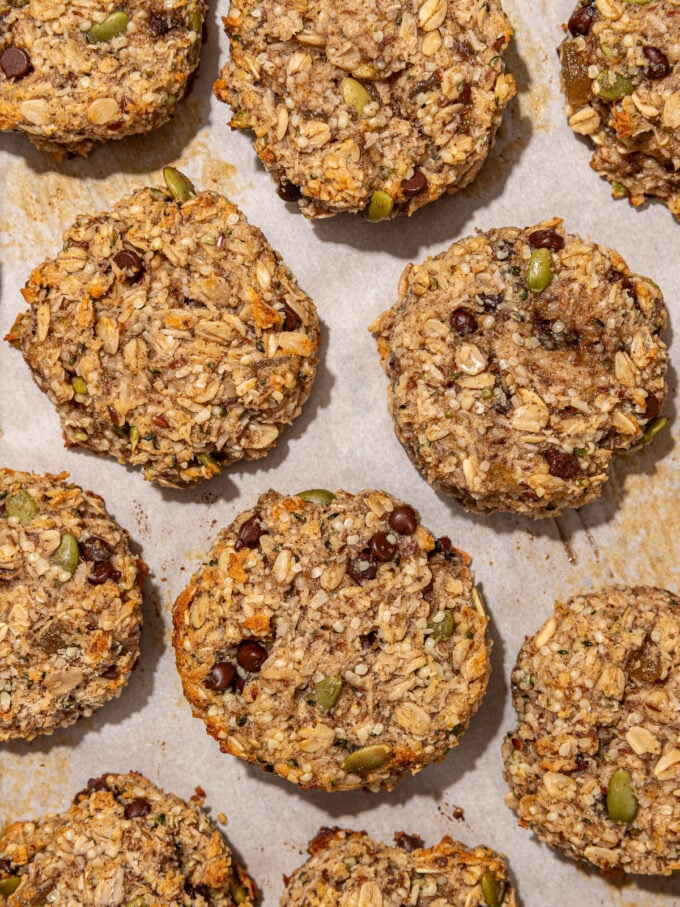 oat, seed and chocolate cookies on baking sheet