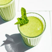 cucumber smoothie in glass with mint