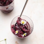 blueberry sorbet with chamomile in glass with spoon