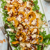 roasted delicata orzo salad on platter with fork