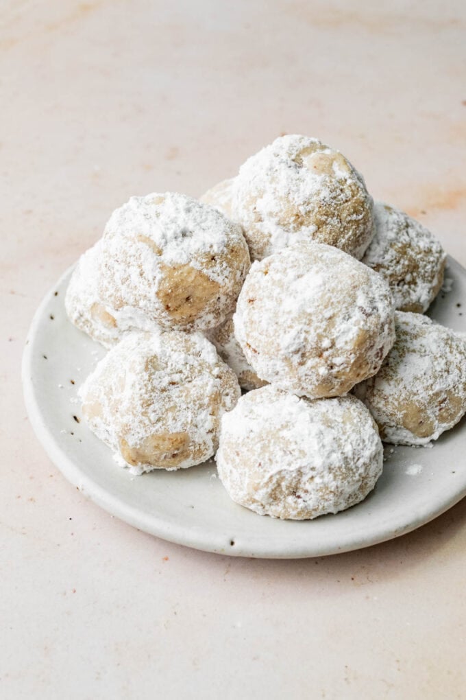 vegan snowball cookies on white plate