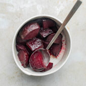 roasted beets in bowl with spoon