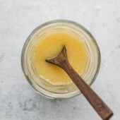 garlic vinaigrette in jar with spoon