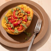 spaghetti squash with peppers and chickpeas on brown plate