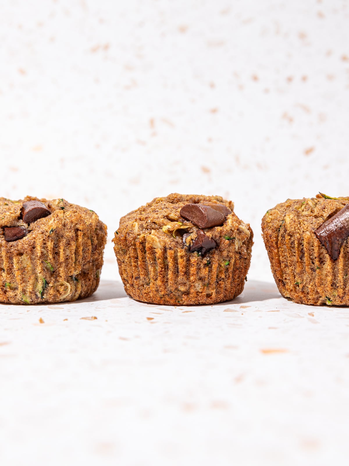 Quick Baked Vegan Zucchini Oat Muffins - Desiree Nielsen