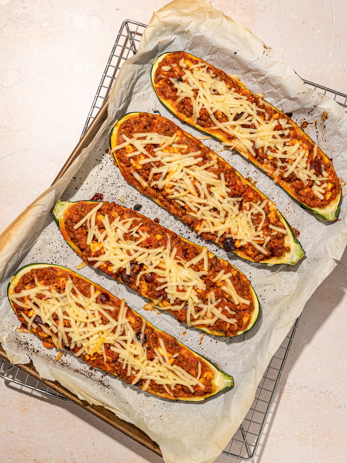 Saucy Lentil-stuffed Zucchini Boats - Desiree Nielsen