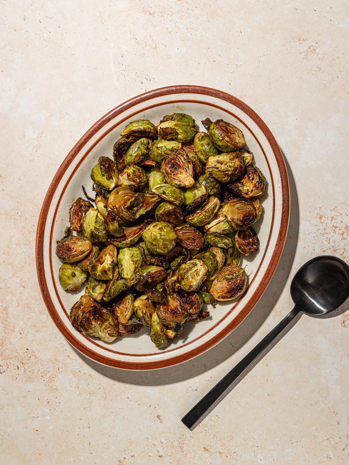 Easy Oven Roasted Maple Balsamic Brussels Sprouts - Desiree Nielsen