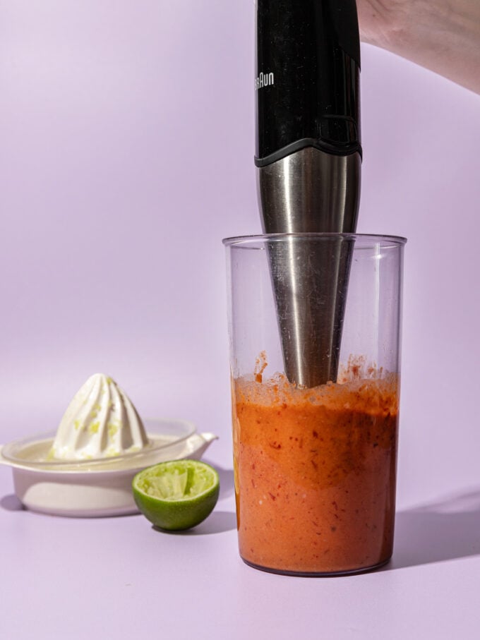 blending chipotle white beans with immersion blender