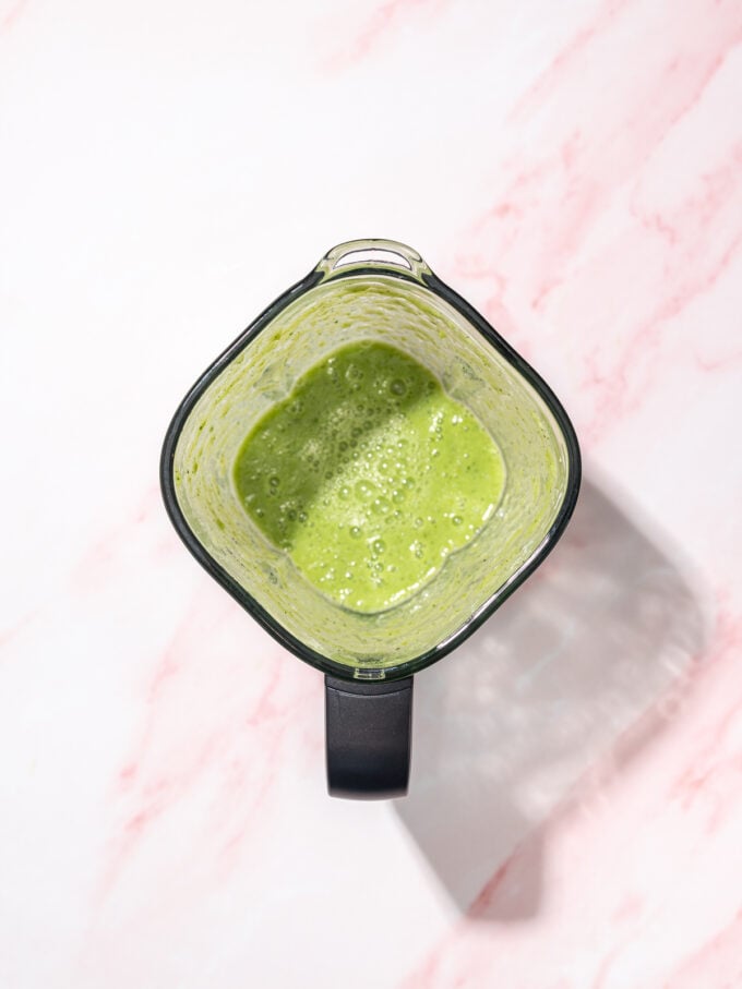 green apple smoothie in blender