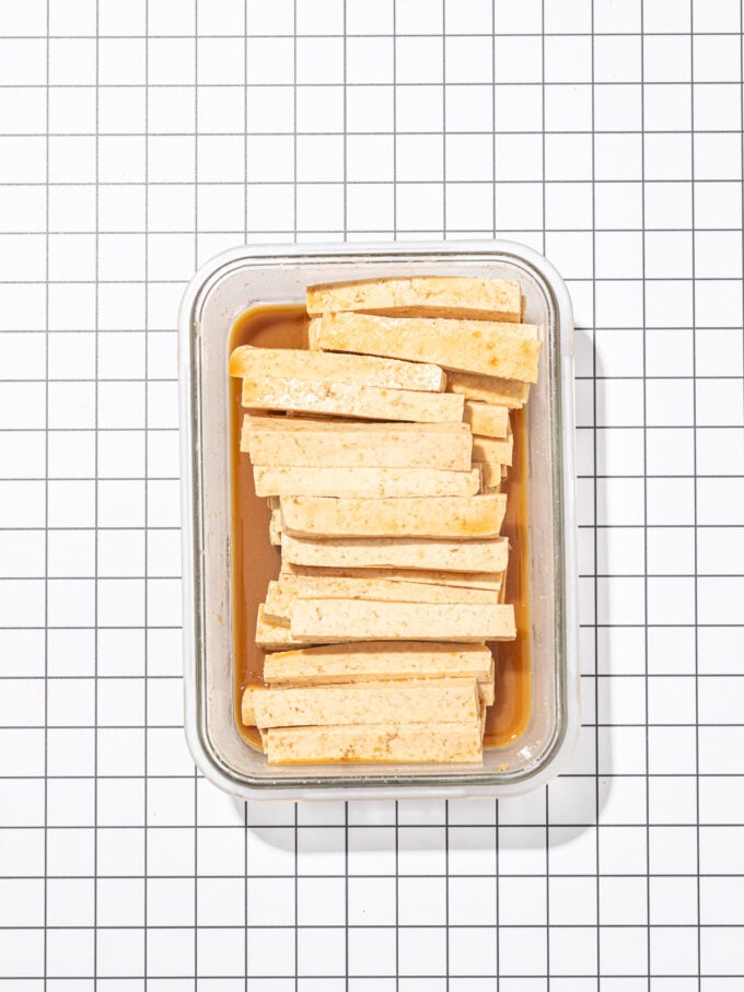 marinated tofu matchsticks in glass dish